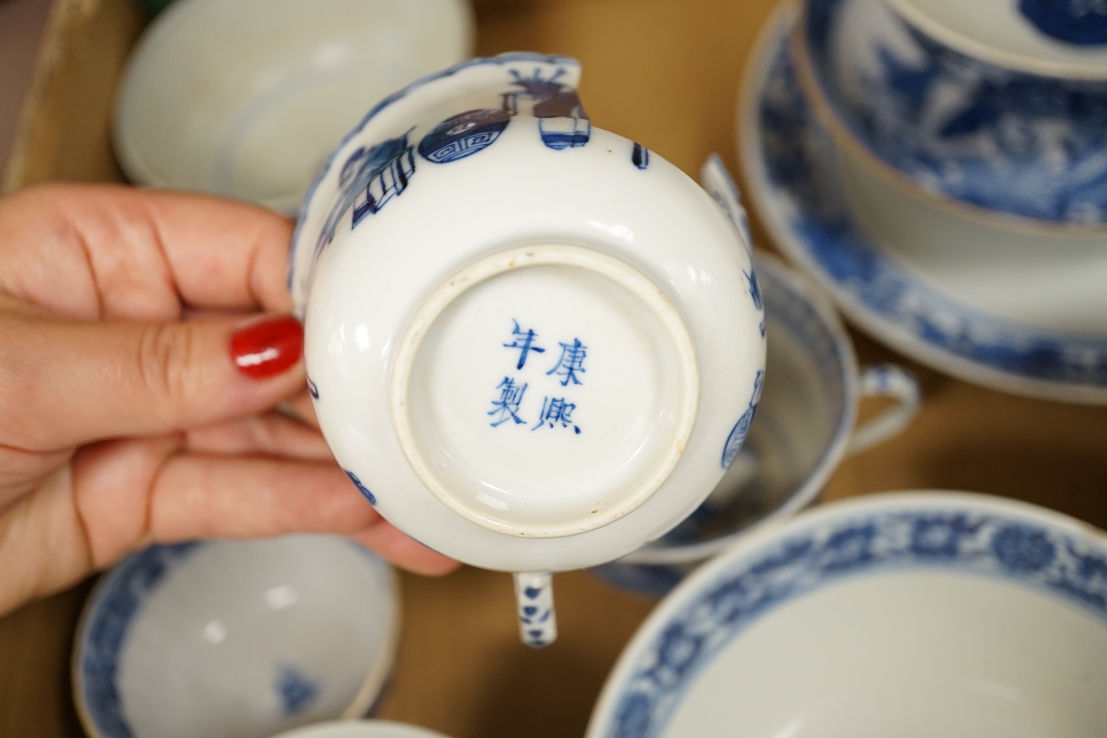 A collection of mostly Chinese blue and white bowls, plates, cups etc. 18th to early 20th century